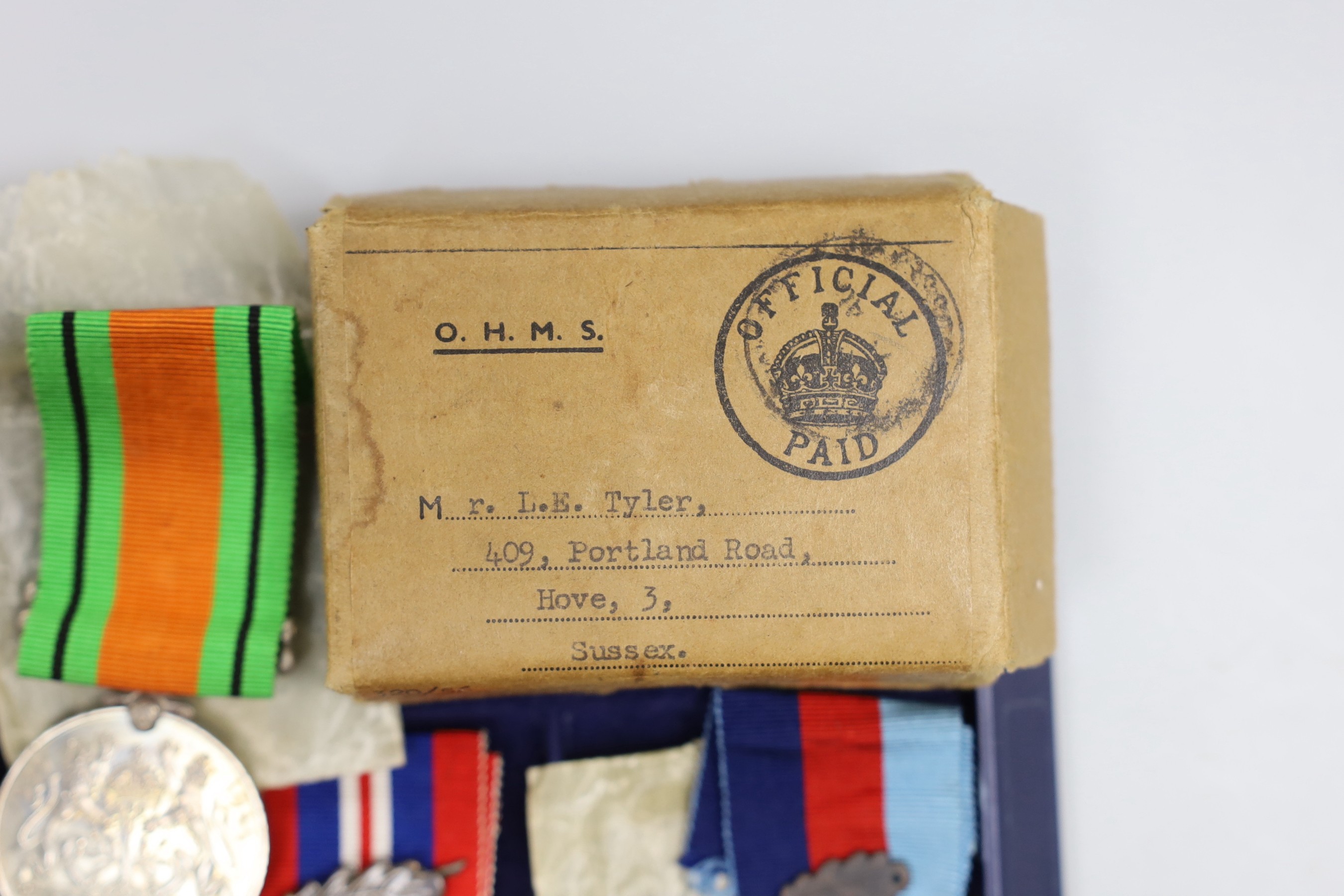 A WWII group of 5 including war medal with oak leaf and 1939-45 star with oak leaf to L.E. TYLER, 8th Army bar (with named box)